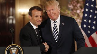 Trump and Macron share an awkward handshake and a kiss [upl. by Roht]