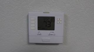 Program Your T705 Programmable Thermostat [upl. by Ailehs]