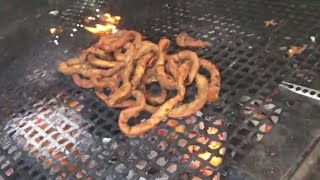 How to cook tripas on a mesquite grill [upl. by Novelia214]