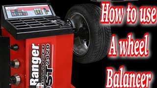 How to use a wheel balancer [upl. by Enniroc170]