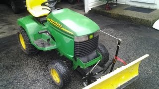 How to Attach a John Deere Tractor Snow Plow [upl. by Enayd]