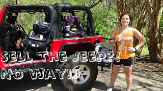 Installing a child seat in a Jeep Wrangler [upl. by Ellenahc843]