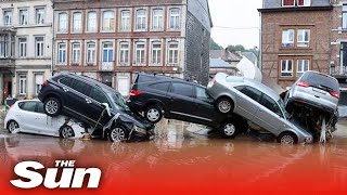 Belgium floods  Torrent of floodwater washes away cars [upl. by Sidman]