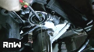 How to Replace a Thermostat on a 97 Subaru Outback 25L Engine [upl. by Fital]