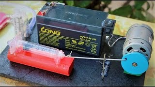 How to Make a Powerful AIR COMPRESSOR using Syringe [upl. by Hukill599]