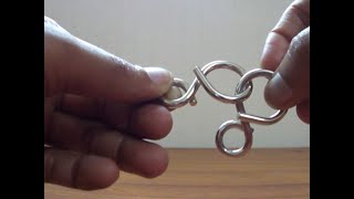 Solution to 8 shaped Metal Ring puzzle [upl. by Evander569]