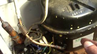 How to remove a fridge compressor from a fridge [upl. by Oivat]