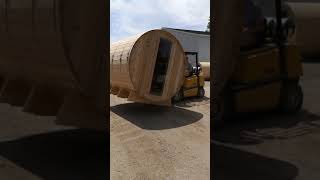 Moving a Barrel Sauna with a Forklift Almost Heaven Saunas [upl. by Llenwad]