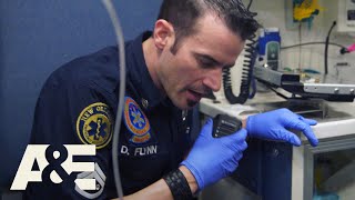 Nightwatch Dan Helps Gunshot Victim to Stay Awake S2 Flashback  AampE [upl. by Nalat690]